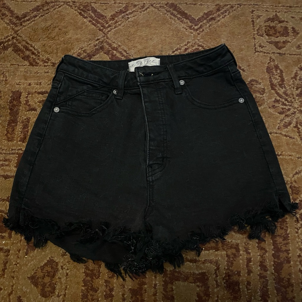 Free people CRVY collection cutoff black denim shorts. Size 27.